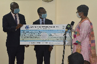 Representatives of NIB making the donation