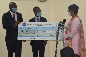 Representatives of NIB making the donation