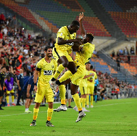 Edwin Gyasi with his teammates