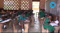 Students writing their BECE at the Kanda Cluster of Schools