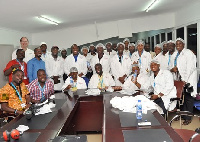 Group picture of journalist and some workers at Voltic Ghana