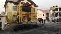 Aggrieved customers burnt car tyres in front of the Amakom branch office