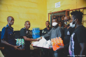 SM Movement team presenting the items to the officers