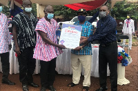 Kingsley Nyarko, MP for Kwadaso (second left) receives a citation