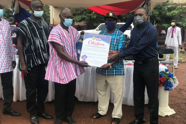 Kingsley Nyarko, MP for Kwadaso (second left) receives a citation