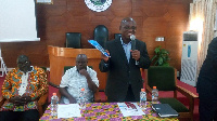 Harrison Kofi Belley, author of the piece, with others at the launch