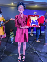 Elizabeth Opoku  with her award