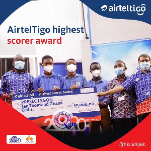 Airteltigo Officials Presenting The Grand Prize To Winners Of The Airteltigo Highest Scorer (PRESEC 