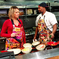 Hass Kwame and another celebrity wearing his apron hand-painted work.