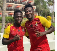 Samuel Owusu with Asamoah Gyan