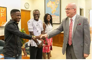 Abraham Attah exchanges pleasantries with US Ambassador Robert Jackson