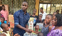 Black Stars defender Jonathan Mensah on Christmas Eve donate items