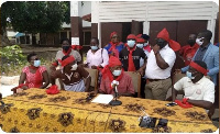 Staff of Holy Child school in red scarfs