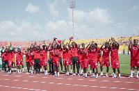 Kotoko players acknowledge their fans after a game