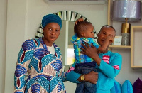 Prophetess Adelaide and her husband with their 3-year-old son