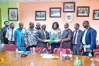 MEDA Ghana Country Director, Robert Austin (left) symbolically handing over the project to COCOBOD