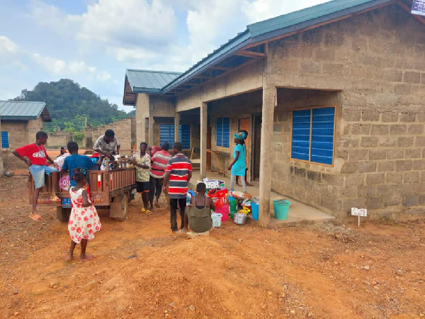 Some of the residents moving into their refurbished homes at Apiate. Photo: Adomonline