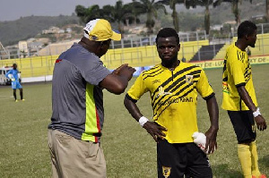 Underfire Ashgold coach Bashir Hayford issuing out instructions to his players