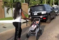 Yvonne Nelson takes a walk with her daughter