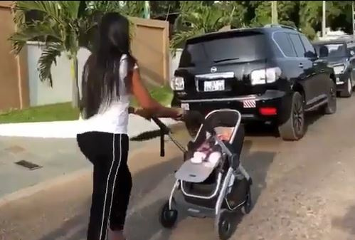 Yvonne Nelson takes a walk with her daughter