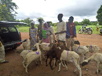 Muhazu Jibril presenting the animals to the beneficiaries