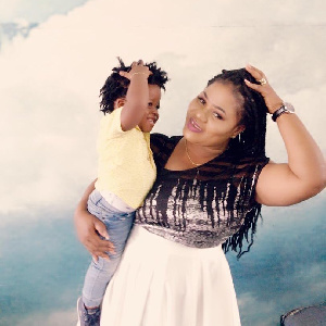 Obaapa Christy and her son