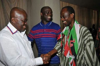 Nana Akufo-Addo shares a handshake with Asiedu Nketia