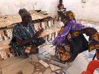 Hajia Zuwera in a chat with one of the elders