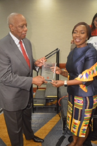 Mrs Esther Cobbah receiving her award