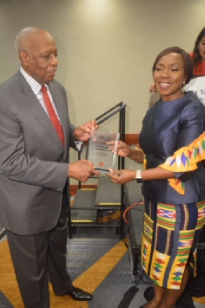 Mrs Esther Cobbah receiving her award