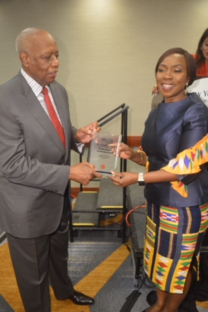 Mrs Esther Cobbah receiving her award