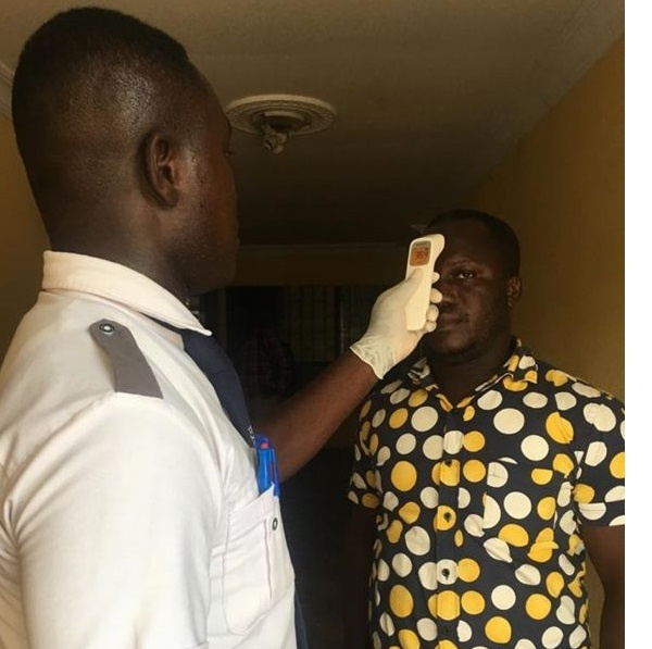 A visitor goes through a check up at the Ministry of Environment