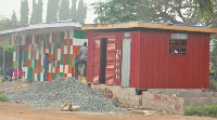 The Presbyterian church claims the construction of containers in front of their premises is illegal