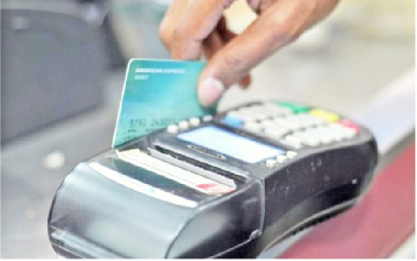 File photo: Electronic payment affords less physical contact with the recipient