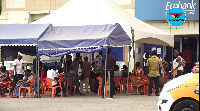 Some customers in front of one of the banks