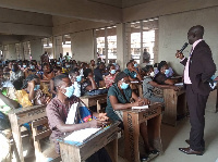 Suame Municipal Director of Education, Pastor Dr Anthony Anyamesem addressing participating teachers