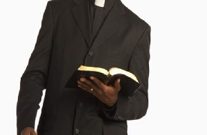 A pastor holding his bible (File photo)