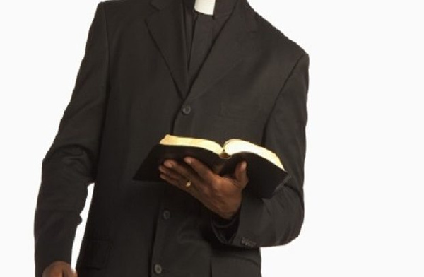 A pastor holding his bible (File photo)