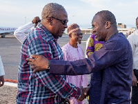 Former  President John Dramani Mahama in a hand shake with Alban Bagbin