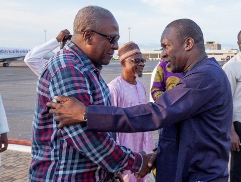 Former  President John Dramani Mahama in a hand shake with Alban Bagbin