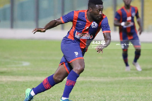 Asamoah Gyan in action for Legon Cities