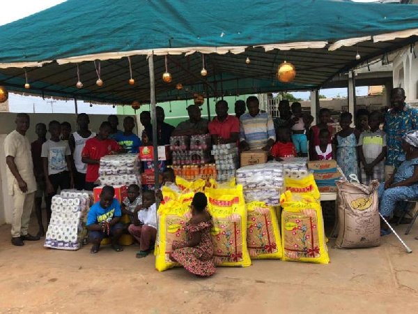 Black Stars technical team with their item at the Teshie Children