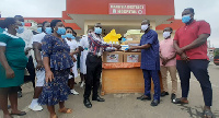 Adam Abdul Majeed donating items to Manhyia Government Hospital