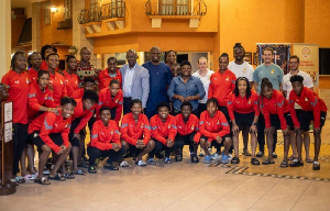 Black Queens with GFA president and Sports Minister