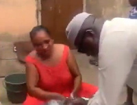 Mike Ocquaye Jnr captured washing for his constituents