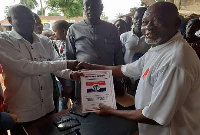 Mr. Leo Nelson Adzidogah, Akatsi South District Chief Executive with others