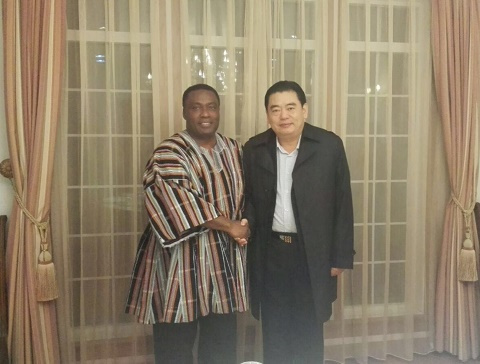 Mr Ankrah in a handshake with Prof Guoqing