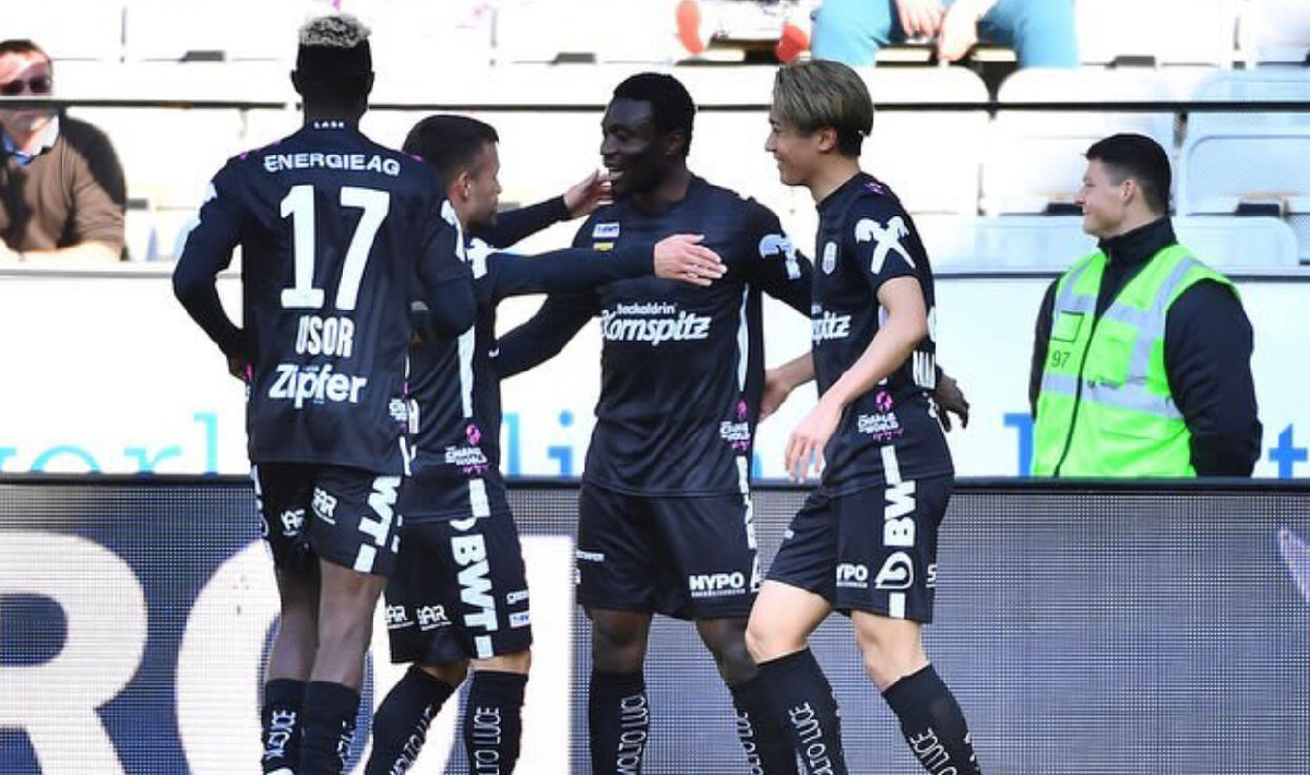 Ibrahim Mustapha (second right) congratulated by teammates