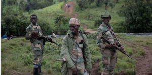 Members of APCLS militia patrol Kitshanga in eastern DRC