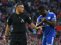 Daniel Amartey confronts referee Andre Marriner after awarding the penalty